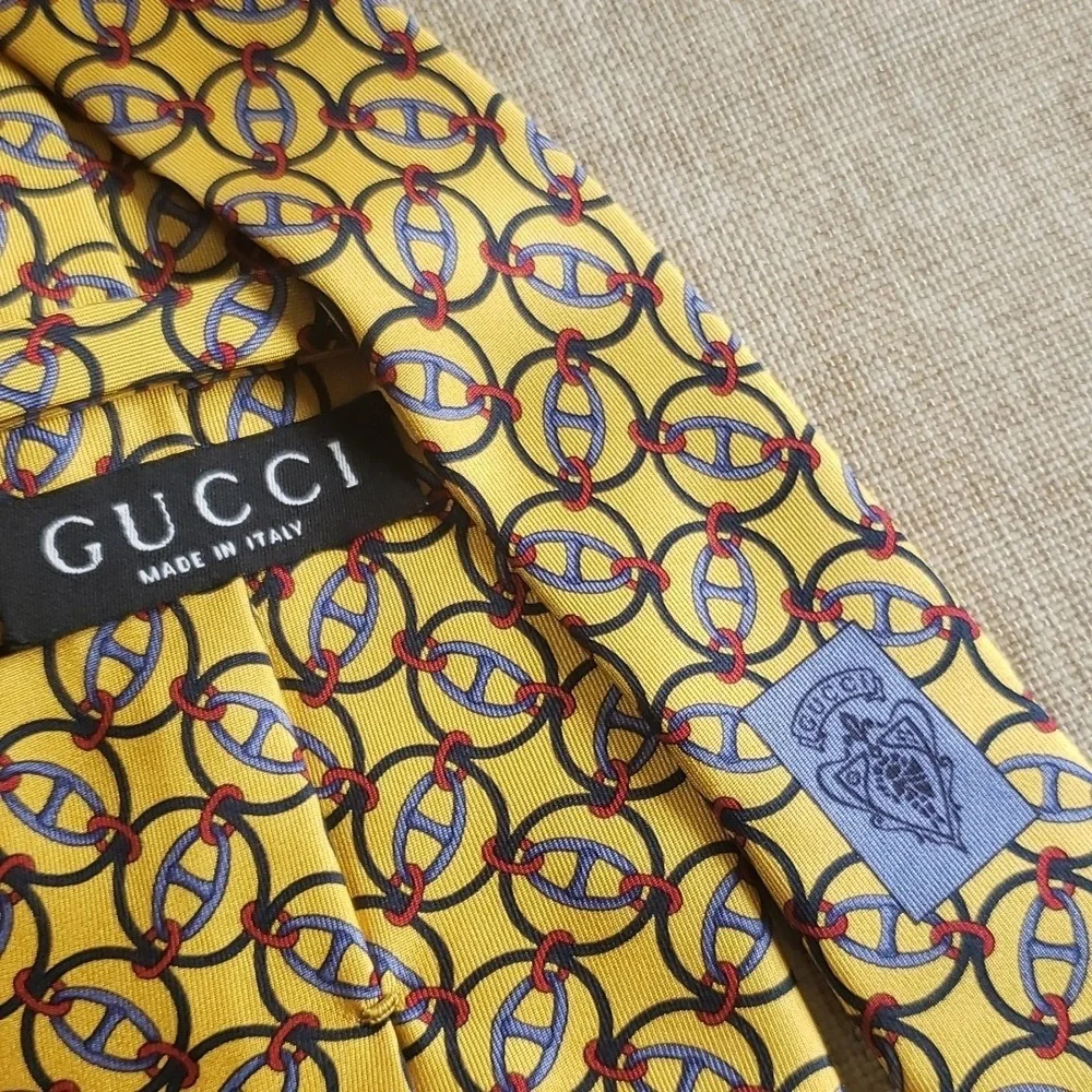 Gucci yellow gold and black silk tie